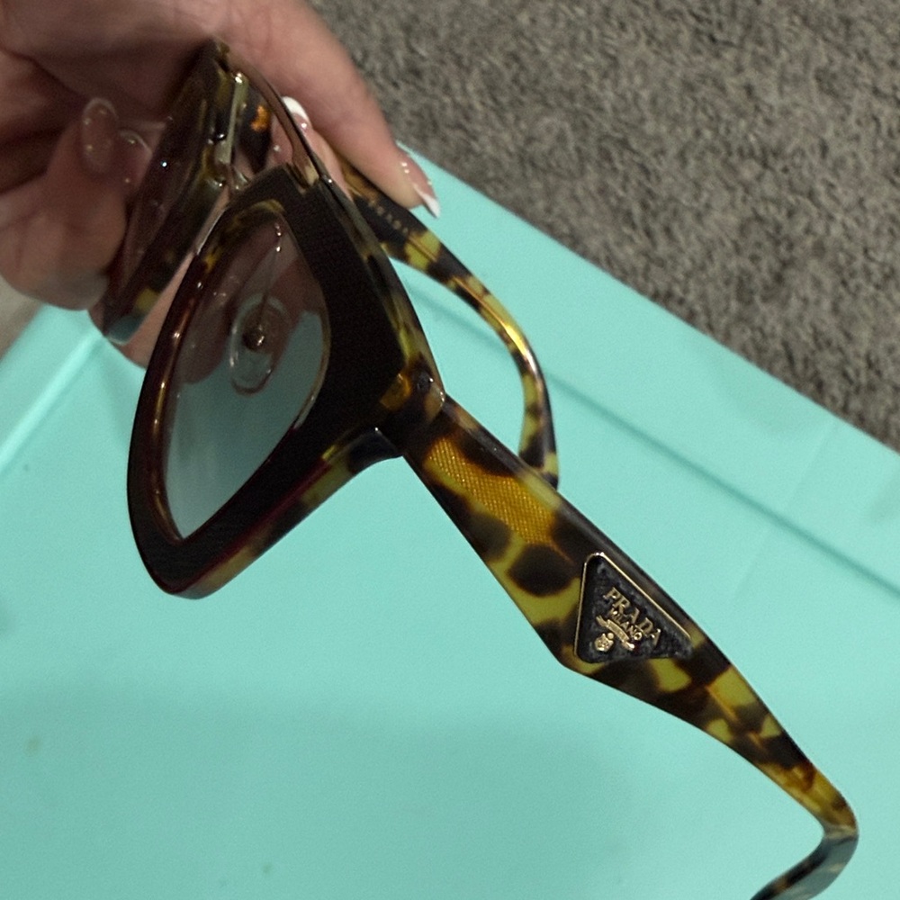 Prada Black Tortoiseshell Cat-Eye Sunglasses with Gold Accents - Picture 2 of 4